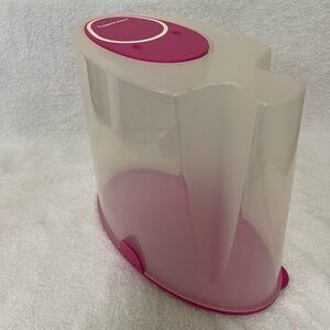 pink Tupperware cereal canister
